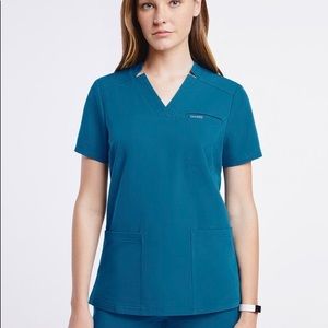 Jaanuu Scrubs XS Top S Joggers Caribbean Blue